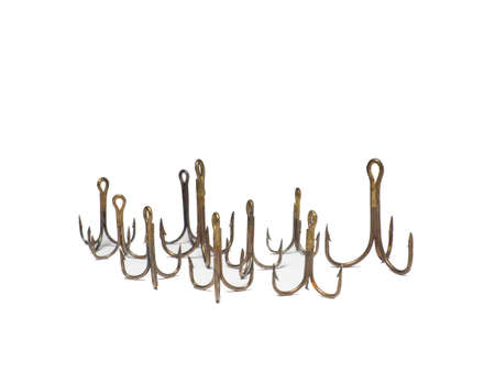 Triple hooks on a white background. Fishing. Tackle. Fishing accessoriesの写真素材