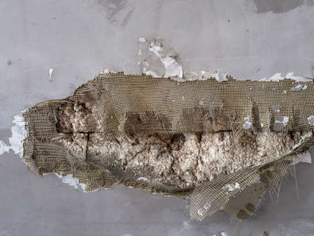 Broken wall, insulation. Renovation work. Repairの写真素材