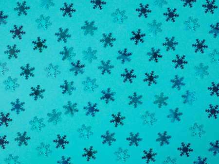 Background from blue snowflakes. Blue background. Christmas patternの写真素材