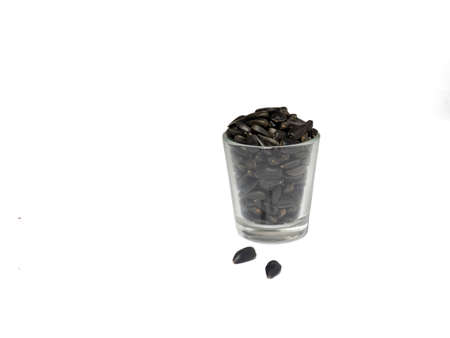A glass with seeds. Sunflower seedsの写真素材