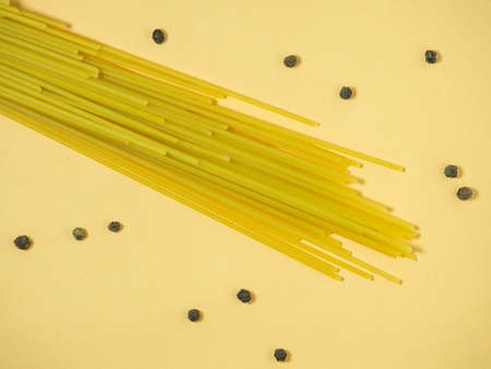 not boiled pasta and peppercorns on the tableの写真素材