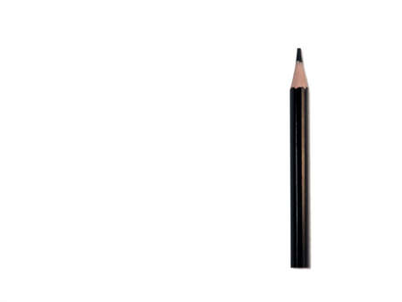 Colored pencil on a white background.Black short pencil made of wood.の写真素材