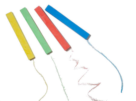 Colored crayons on a white background. Drawing with chalk.の写真素材