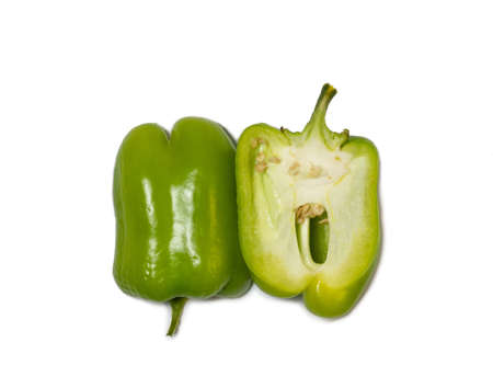 Sliced dolma pepper on a white background. A juicy beautiful vegetable. Green sweet pepper. Isolate on white.の写真素材