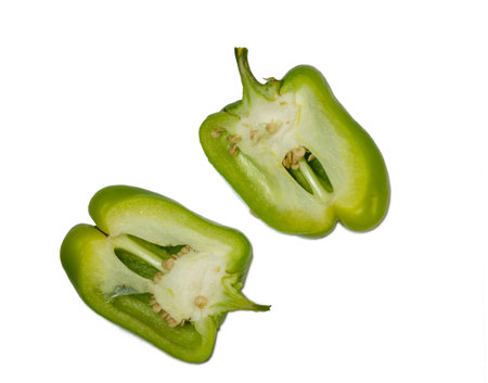 Sliced dolma pepper on a white background. A juicy beautiful vegetable. Green sweet pepper. Isolate on white.の写真素材