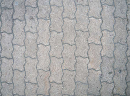 Road tiles. Asphalt. Masonry. made of solid material. Concrete. Patterned surfaceの写真素材
