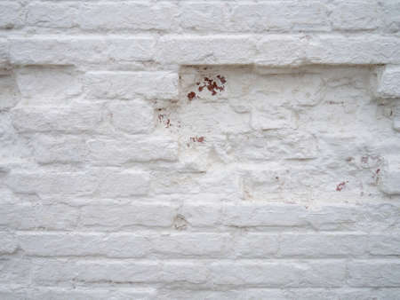Old, uneven masonry. Wall pit, whitewashed brick, brickworkの写真素材