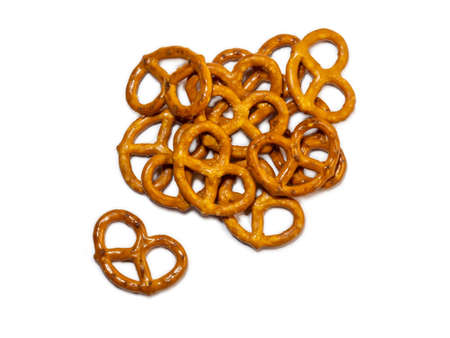 Pretzels with salt on a white background. Flour products. Baking for tea.
A bunch of pretzels. Lots of pieces.の写真素材