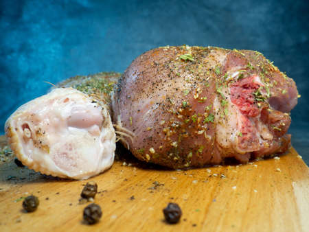 Turkey drumsticks in spices lie on a kitchen cutting board. Poultry meat. Turkey leg. Juicy meat is waiting to be cooked. Waiting for the oven.
Uncooked product.Food like in a restaurantの写真素材