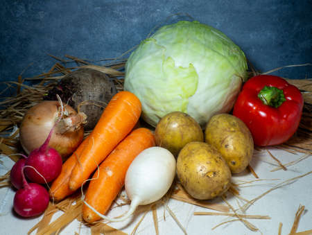 Still life of vegetables. Healthy food. Harvest from the garden. Farmer. Borsch set. Harvest root vegetables on the tableの写真素材