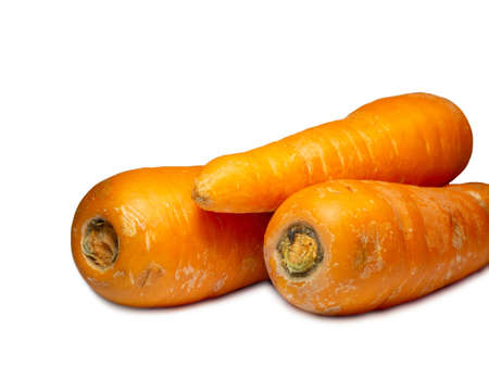 carrots on a white background. Healthy diet. Root vegetable isolate. Harvest from the gardenの写真素材