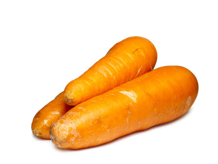 carrots on a white background. Healthy diet. Root vegetable isolate. Harvest from the gardenの写真素材