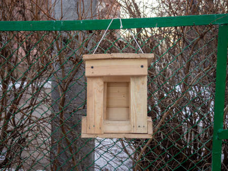 bird feeders. Winter street. Architecture. Caring for animalsの写真素材