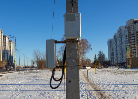 Electric panel on the pole. Technology in the city. Electrificationの写真素材