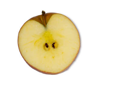 Cut off half of a red apple. Fresh fruit isolate.Healthy dietの写真素材