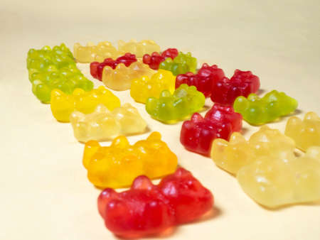 The gummy bears lie nearby. Sweets in the form of animals. Unhealthy foodの写真素材