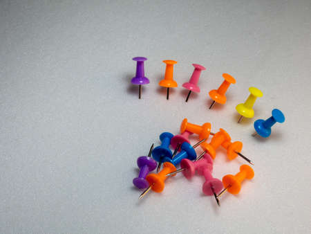 colored memothumb tacks. Stationery on white background. necessary for the officeの写真素材