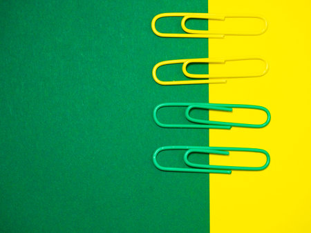 Paper work. Colored paper clips. Colored paper with staples. Work with documents. Office. Colorful...
