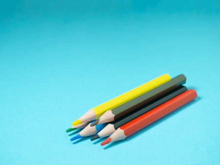 School supplies.   Multicolored pencils.  The process of preparing for work. Creative messの写真素材