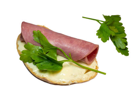 Sandwich with  beef, melted cheese and parsley. Homemade food. Food in a hurry. Snack for lunchの写真素材