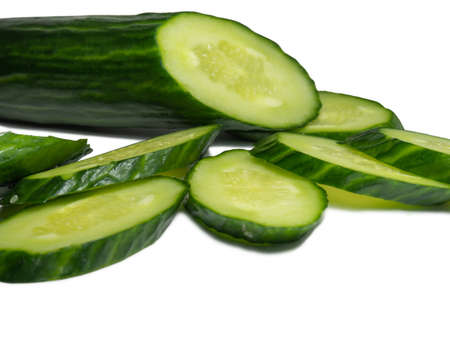 Smooth medium-sized cucumber on a white background. Cucumber slices, isolate. Sliced ââvegetable. Vegetable isolate. Greenの写真素材