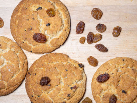 Oatmeal cookies . Cookies with raisins on the table. Raisins on the table. Sweet treat. Healthy diet. food for breakfastの写真素材