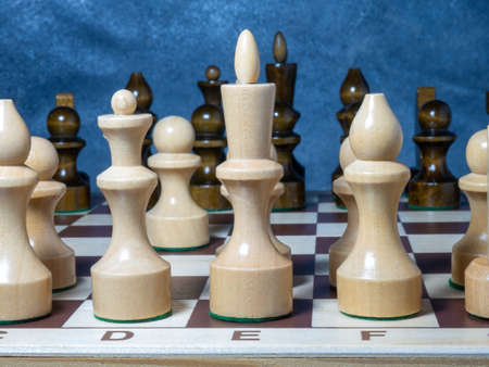 Chess board with figures. Wooden chess. Board games. Location of opponents. Counter strategy. Analytical mind.の写真素材