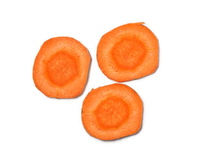 sliced ââcarrot. Carrot slices on a white background. Vegetarian food. vitamins. fresh vegetablesの写真素材
