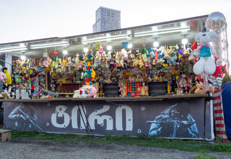 A toy shop. Soft toys on the shelves. Sale for children. beautiful shopのeditorial素材