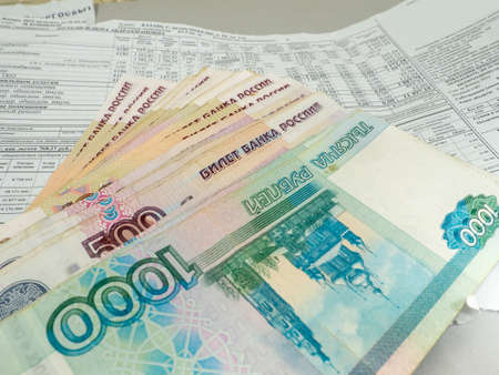 finance. Russian money. Money on a pay stub. Payment of utility servicesの写真素材