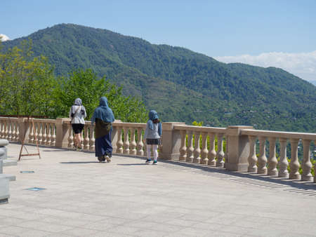 People in headscarves after visiting the church. Sight. viewpoint. Beautiful place Architecture and natureの写真素材