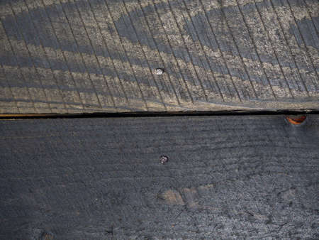 Background from burnt boards. blackwood. Burnt wood wall. boards after the fire. Textureの写真素材