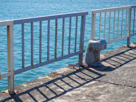 Bollards on the seashore. A place to stop ships. Give a mooring line. The place where the ship is attached to the shoreの写真素材