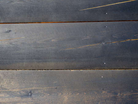 Background from wooden boards. wooden wall. natural material. dark boardsの写真素材