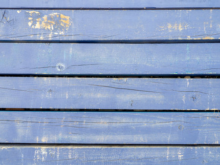 Boards painted in lilac color. wood background. Wall made of natural material. Shabby surface. The surface of the wooden deckの写真素材