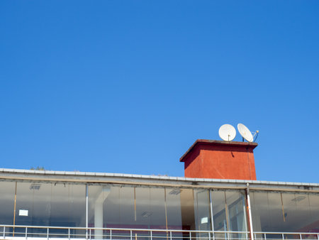 Satellite dishes on the roof. Cable TV. signal reception. Modern communications and technologiesの写真素材