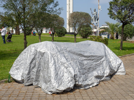 Something covered in fabric. Hidden under the covers. Construction. repair. Hidden from the eyesのeditorial素材