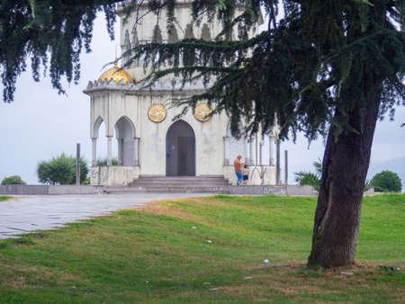Beautiful unusual building in the park. Place for walking. Chacha fountain. Georgian architectureの写真素材