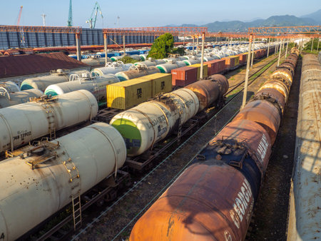 Batumi, Georgia. 08.30.2022 Railroad in the city. Many railway paths. Wagons and trains on the tracks. unloading station. Tank wagons.のeditorial素材