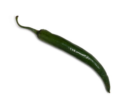 Fresh green chili peppers. Spicy vegetable isolate. Peppers on a white background. Ingredient for dishes. The concept of spicy food. fresh chili pepper. Harvesting vegetables for seasonings. healthy foodの写真素材