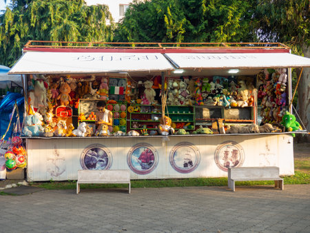 Batumi, Georgia. 08.16.2022 Shooting range with prizes. Stall with soft toys. resort business. Attraction for vacationers. Tyr.のeditorial素材