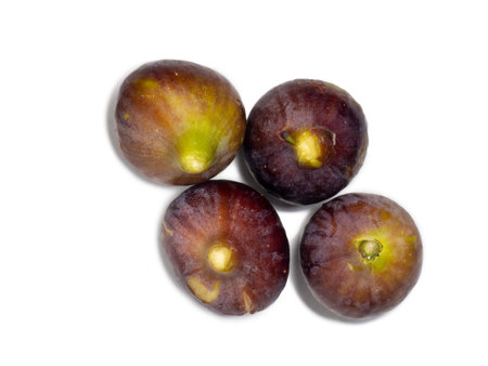 Ripe figs on a white background. Several figs. Southern fruit isolate. purple fruit. healthy diet. For dietの写真素材
