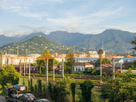 View of the old railway station and mountains. A beautiful place in the mountains. railway ways. Train station in Batumi. city and mountains.の写真素材