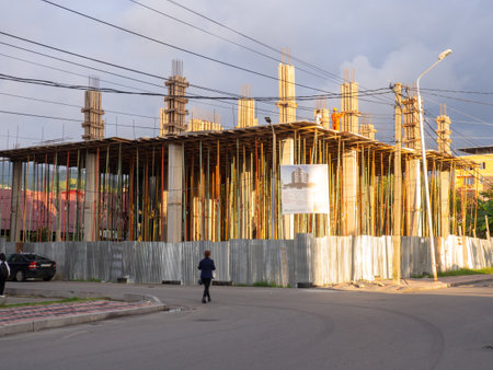 Batumi, Georgia. 10.18.2022 One of the stages of building a house. Substituted iron supports under the hardening concrete. scaffolding. construction industry.のeditorial素材