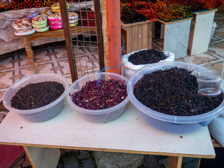 Bags with different types of tea on the market. Packing and sale of leaf tea. weight tea. drink ingredient. different varietiesの写真素材