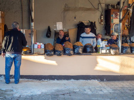 Batumi, Georgia. 10.22.2022  Tobacco vendors at work. East market. Georgian market. Emotional people. Sale of goods. Goods for smoking. Varieties of tobaccoのeditorial素材