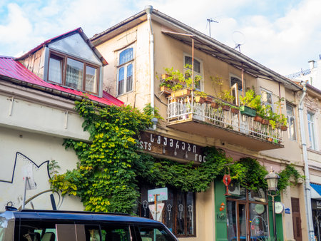 Batumi, Georgia. 10.29.2022 Streets of the southern city. Ivy on the building. Resort place. Streets of Batumi. House overgrown with greenery. Beautiful facade. Nature and architecture. The concept of the struggle between nature and the cityのeditorial素材