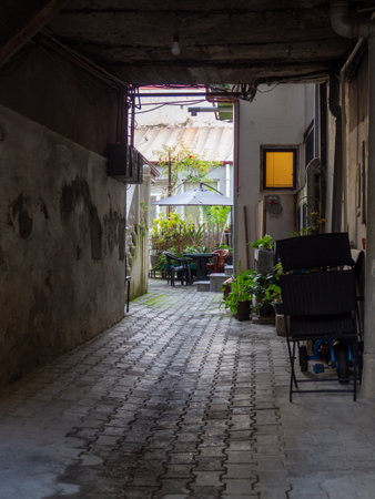 Sunset on the background of the old city. Narrow streets. Streets of the southern city. Resort place. Streets of Batumi. Beautiful facade. Patioの写真素材