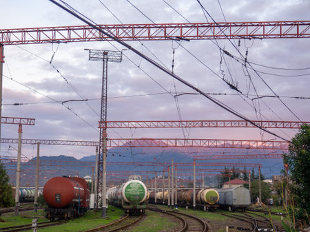 Batumi, Georgia. 28/10/2022 Tanks with fuel on the railway tracks at sunset. Sunset at the train...