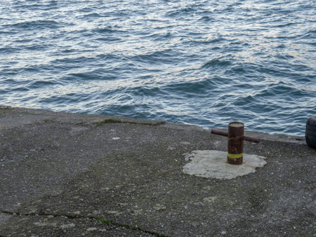 Bollard for mooring. Place for fixing the ship. Mooring. iron posts. At the seaport. The concept of navigation.の写真素材
